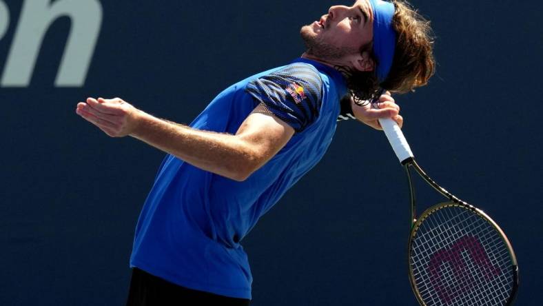 Aug 30, 2023; Flushing, NY, USA; Stefanos Tsitsipas of Greece serves to Dominic Stricker of Switzerland on day three of the 2023 U.S. Open tennis tournament at USTA Billie Jean King National Tennis Center. Mandatory Credit: Danielle Parhizkaran-USA TODAY Sports