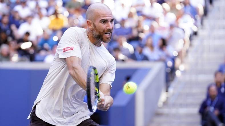 Sep 1, 2023; Flushing, NY, USA; Adrian Mannarino of France hits to Frances Tiafoe of the United States on day five of the 2023 U.S. Open tennis tournament at USTA Billie Jean King National Tennis Center. Mandatory Credit: Danielle Parhizkaran-USA TODAY Sports