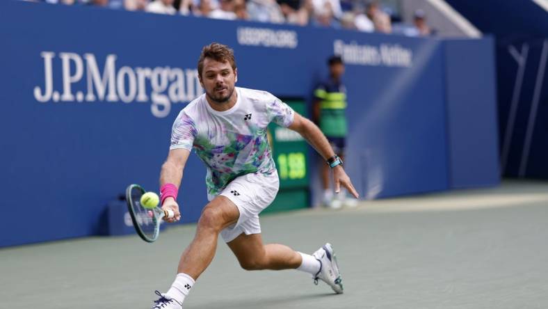 Sep 2, 2023; Flushing, NY, USA; Stan Wawrinka of Switzerland reaches for a forehand against Jannik Sinner of Italy (not pictured) on day six of the 2023 U.S. Open tennis tournament at USTA Billie Jean King National Tennis Center. Mandatory Credit: Geoff Burke-USA TODAY Sports