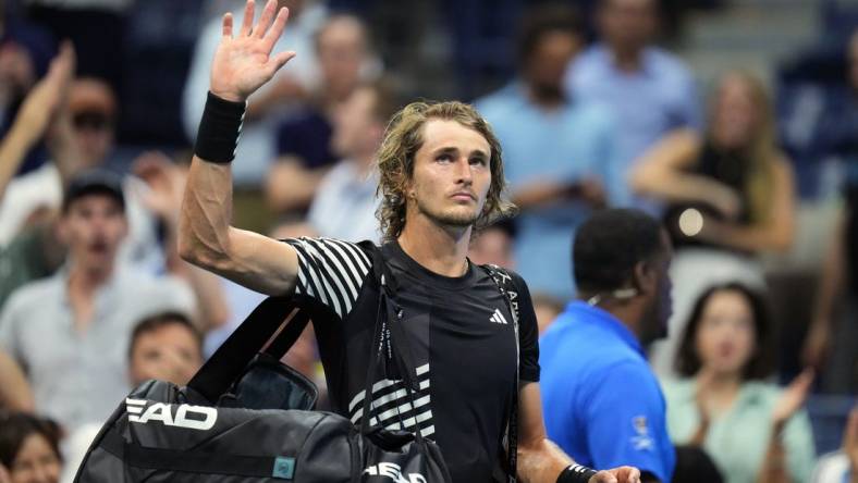 Sep 6, 2023; Flushing, NY, USA; Alexander Zverev of Germany waves to the crowd after losing to Carlos Alcaraz of Spain on day ten of the 2023 U.S. Open tennis tournament at USTA Billie Jean King National Tennis Center. Mandatory Credit: Danielle Parhizkaran-USA TODAY Sports