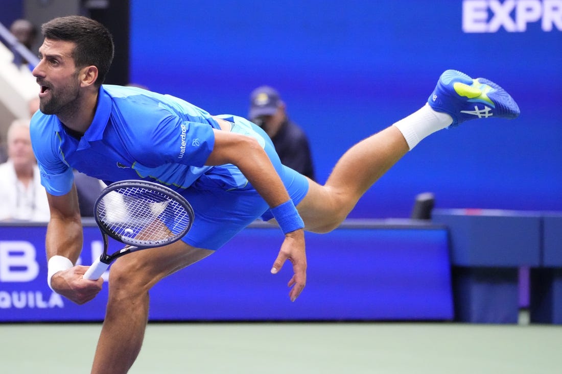 Sep 10, 2023; Flushing, NY, USA; Novak Djokovic of Serbia serves against Daniil Medvedev (not pictured) in the men's singles final on day fourteen of the 2023 U.S. Open tennis tournament at USTA Billie Jean King National Tennis Center. Mandatory Credit: Robert Deutsch-USA TODAY Sports