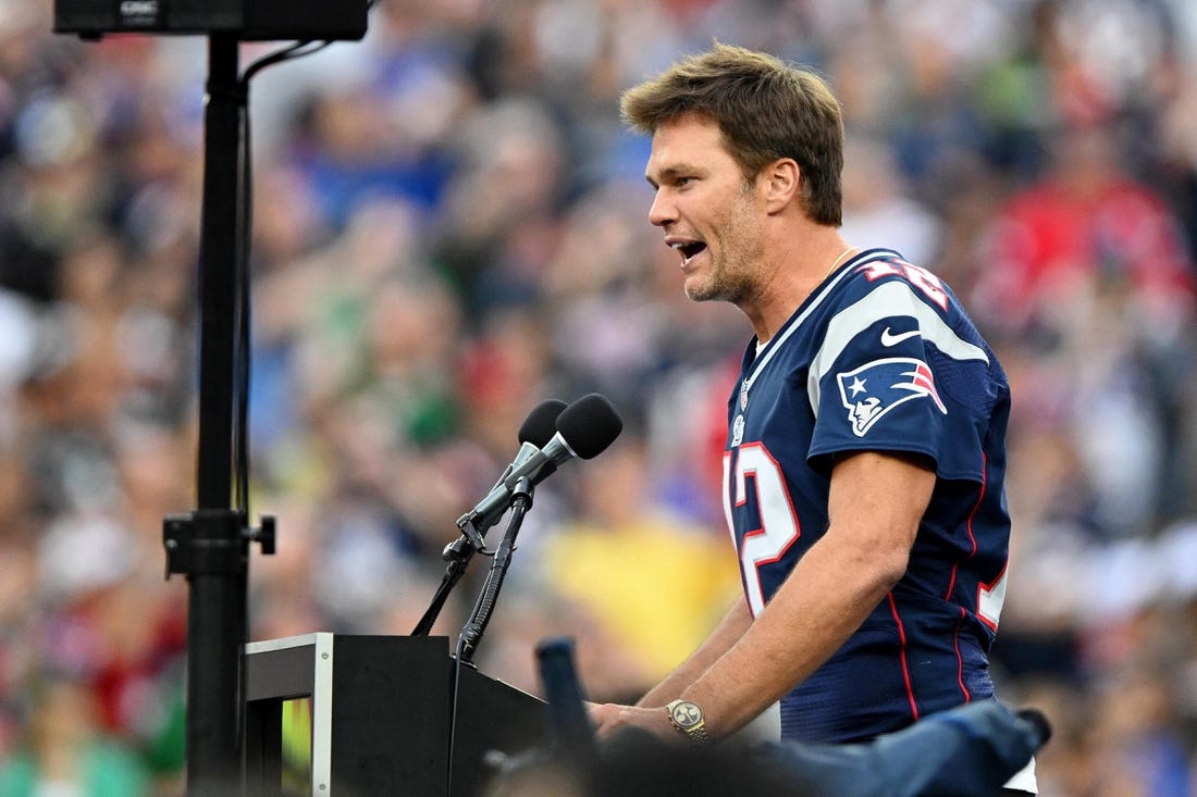 Sep 10, 2023; Foxborough, Massachusetts, USA; New England Patriots former quarterback Tom Brady speaks during a halftime ceremony in his honor during the game between the Philadelphia Eagles and New England Patriots at Gillette Stadium. Mandatory Credit: Brian Fluharty-USA TODAY Sports