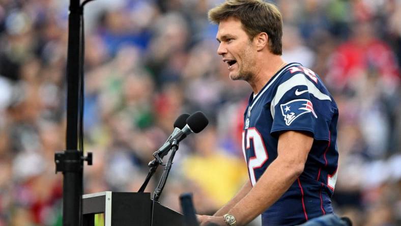 Sep 10, 2023; Foxborough, Massachusetts, USA; New England Patriots former quarterback Tom Brady speaks during a halftime ceremony in his honor during the game between the Philadelphia Eagles and New England Patriots at Gillette Stadium. Mandatory Credit: Brian Fluharty-USA TODAY Sports