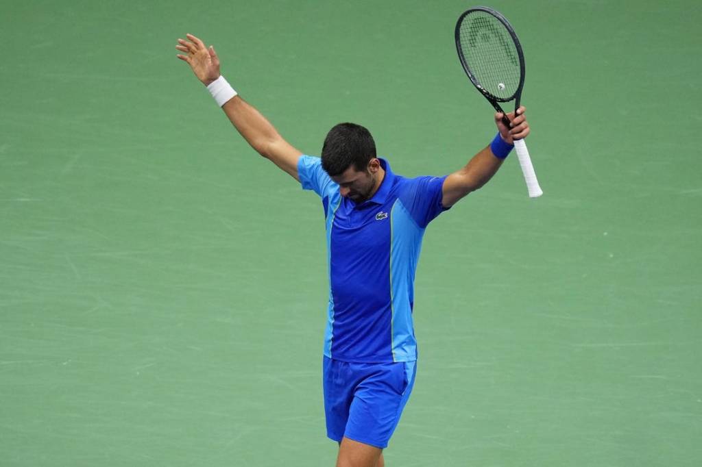 Sep 10, 2023; Flushing, NY, USA; Novak Djokovic of Serbia reacts after winning a point against Daniil Medvedev (not pictured) in the men's singles final in the men's singles final on day fourteen of the 2023 U.S. Open tennis tournament at USTA Billie Jean King National Tennis Center. Mandatory Credit: Danielle Parhizkaran-USA TODAY Sports