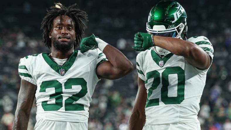 Sep 11, 2023; East Rutherford, New Jersey, USA; New York Jets running back Michael Carter (32) and running back Breece Hall (20) pose for a photo before the game against the Buffalo Bills at MetLife Stadium. Mandatory Credit: Vincent Carchietta-USA TODAY Sports