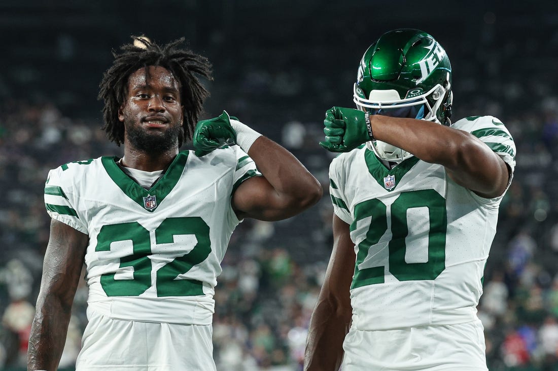 Sep 11, 2023; East Rutherford, New Jersey, USA; New York Jets running back Michael Carter (32) and running back Breece Hall (20) pose for a photo before the game against the Buffalo Bills at MetLife Stadium. Mandatory Credit: Vincent Carchietta-USA TODAY Sports