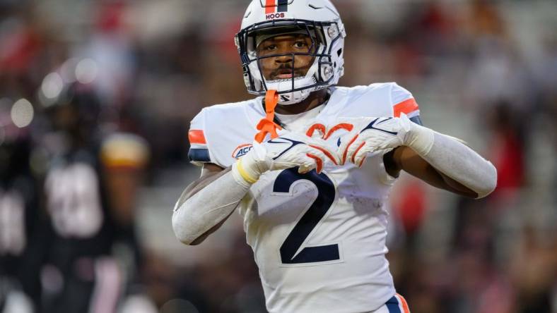 Sep 15, 2023; College Park, Maryland, USA; Virginia Cavaliers running back Perris Jones (2) reacts after scoring a touchdown during the first quarter against the Maryland Terrapins at SECU Stadium. Mandatory Credit: Reggie Hildred-USA TODAY Sports