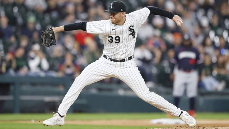 Sep 16, 2023; Chicago, Illinois, USA; Chicago White Sox relief pitcher Aaron Bummer (39) pitches against the Minnesota Twins during the sixth inning at Guaranteed Rate Field. Mandatory Credit: Kamil Krzaczynski-USA TODAY Sports