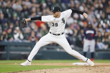 Sep 16, 2023; Chicago, Illinois, USA; Chicago White Sox relief pitcher Aaron Bummer (39) pitches against the Minnesota Twins during the sixth inning at Guaranteed Rate Field. Mandatory Credit: Kamil Krzaczynski-USA TODAY Sports