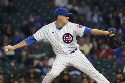 Sep 21, 2023; Chicago, Illinois, USA; Chicago Cubs starting pitcher Kyle Hendricks (28) throws the ball against the Pittsburgh Pirates during the first inning at Wrigley Field. Mandatory Credit: David Banks-USA TODAY Sports