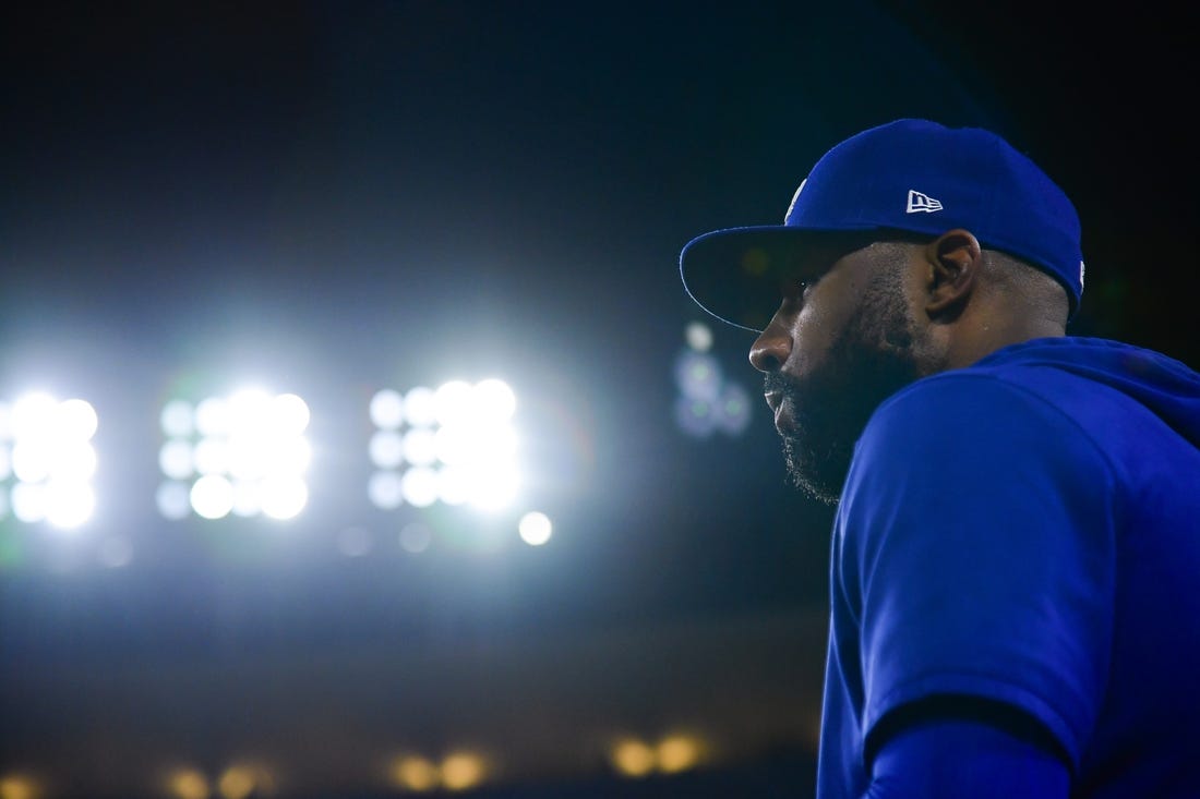 Sep 21, 2023; Los Angeles, California, USA; Los Angeles Dodgers right fielder Jason Heyward (23) watches game action against the San Francisco Giants during the ninth inning at Dodger Stadium. Mandatory Credit: Gary A. Vasquez-USA TODAY Sports