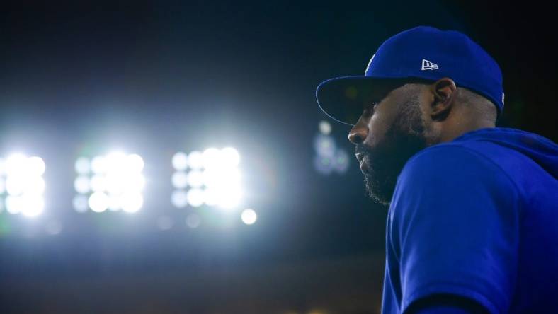 Sep 21, 2023; Los Angeles, California, USA; Los Angeles Dodgers right fielder Jason Heyward (23) watches game action against the San Francisco Giants during the ninth inning at Dodger Stadium. Mandatory Credit: Gary A. Vasquez-USA TODAY Sports