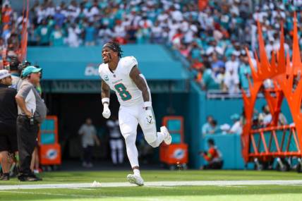 Sep 24, 2023; Miami Gardens, Florida, USA;  Miami Dolphins safety Jevon Holland (8) is introduced onto the field before a game against the Denver Broncos at Hard Rock Stadium. Mandatory Credit: Nathan Ray Seebeck-USA TODAY Sports