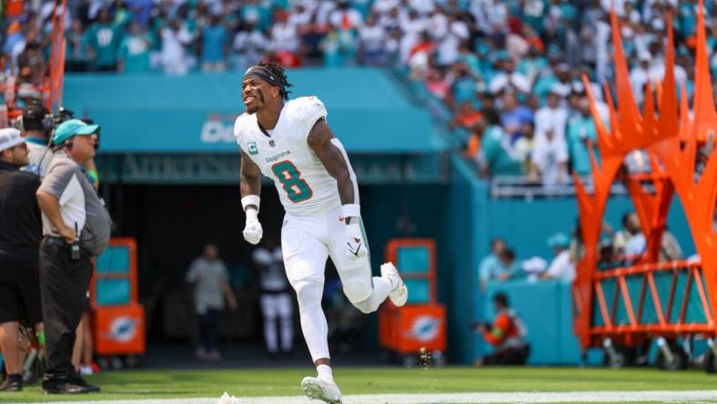 Sep 24, 2023; Miami Gardens, Florida, USA;  Miami Dolphins safety Jevon Holland (8) is introduced onto the field before a game against the Denver Broncos at Hard Rock Stadium. Mandatory Credit: Nathan Ray Seebeck-USA TODAY Sports