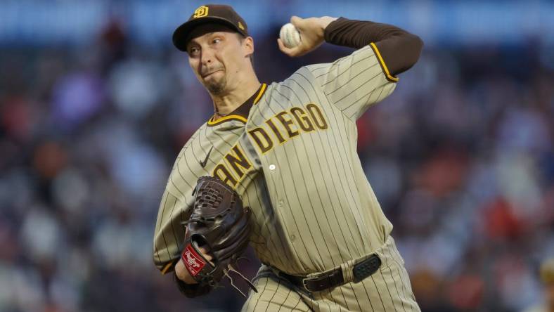 Sep 25, 2023; San Francisco, California, USA; San Diego Padres starting pitcher Blake Snell (4) pitches during the first inning against the San Francisco Giants at Oracle Park. Mandatory Credit: Sergio Estrada-USA TODAY Sports