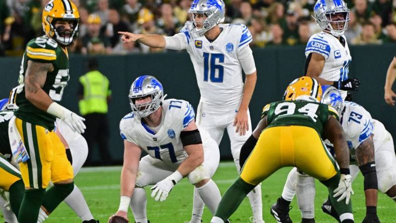 Sep 28, 2023; Green Bay, Wisconsin, USA; Detroit Lions quarterback Jared Goff (16) calls a play in the second quarter against the Green Bay Packers at Lambeau Field. Mandatory Credit: Benny Sieu-USA TODAY Sports