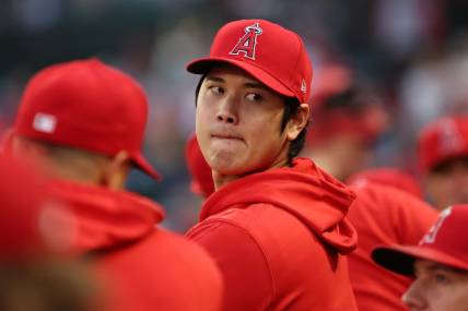 Sep 30, 2023; Anaheim, California, USA; Los Angeles Angels two-way player Shohei Ohtani (17) watches a game against the Oakland Athletics from the dugout at Angel Stadium. Mandatory Credit: Kiyoshi Mio-USA TODAY Sports