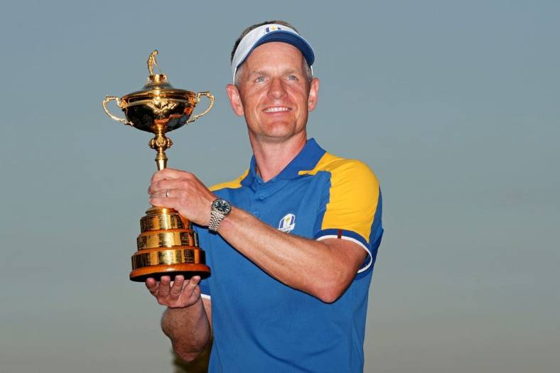 Oct 1, 2023; Rome, ITA; Team Europe captain Luke Donald poses with the Ryder Cup after Team Europe beat Team USA  during the final day of the 44th Ryder Cup golf competition at Marco Simone Golf and Country Club. Mandatory Credit: Kyle Terada-USA TODAY Sports