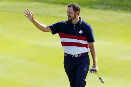 Oct 1, 2023; Rome, ITA; Team USA golfer Patrick Cantlay waves to the gallery on the 12th hole during the final day of the 44th Ryder Cup golf competition at Marco Simone Golf and Country Club. Mandatory Credit: Adam Cairns-USA TODAY Sports