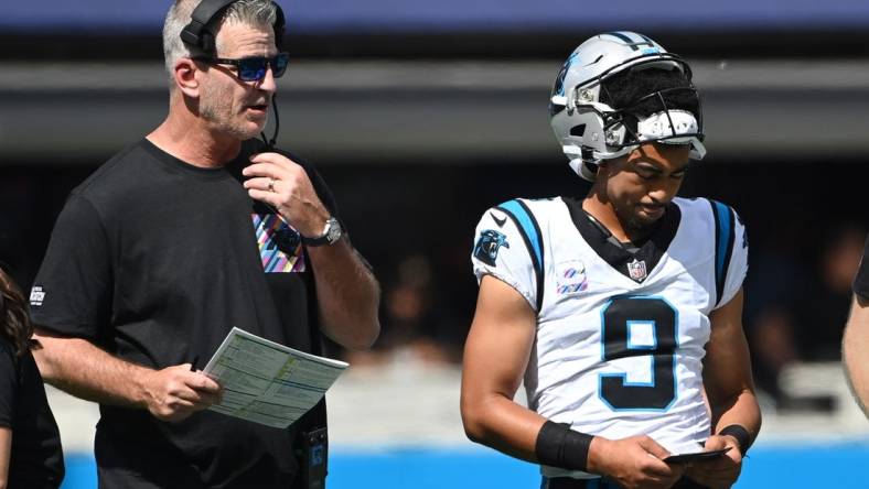 Oct 1, 2023; Charlotte, North Carolina, USA; Carolina Panthers head coach Frank Reich with quarterback Bryce Young (9) in the second quarter at Bank of America Stadium. Mandatory Credit: Bob Donnan-USA TODAY Sports