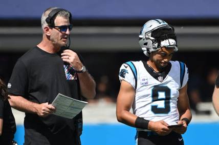 Oct 1, 2023; Charlotte, North Carolina, USA; Carolina Panthers head coach Frank Reich with quarterback Bryce Young (9) in the second quarter at Bank of America Stadium. Mandatory Credit: Bob Donnan-USA TODAY Sports