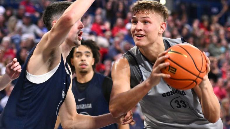 Oct 7, 2023; Seattle, WA, USA; Gonzaga Bulldogs forward Ben Gregg (33) shoots the ball against Gonzaga Bulldogs guard Steele Venters (2) during Kraziness at the Kennel at the McCarthey Athletic Center. Mandatory Credit: James Snook-USA TODAY Sports