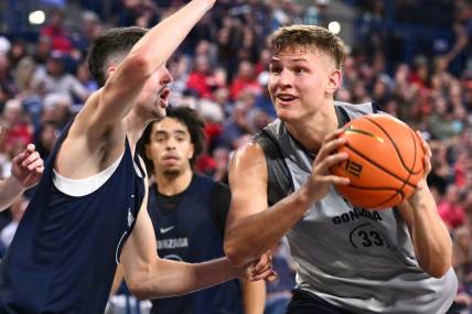 Oct 7, 2023; Seattle, WA, USA; Gonzaga Bulldogs forward Ben Gregg (33) shoots the ball against Gonzaga Bulldogs guard Steele Venters (2) during Kraziness at the Kennel at the McCarthey Athletic Center. Mandatory Credit: James Snook-USA TODAY Sports