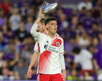 Oct 7, 2023; Orlando, Florida, USA;  New England Revolution forward Tomas Chancalay (5) reacts after breaking a shoe against Orlando City SC in the second half at Exploria Stadium. Mandatory Credit: Nathan Ray Seebeck-USA TODAY Sports