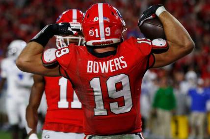 Georgia tight end Brock Bowers (19) celebrates after scoring a touchdown against Kentucky in Athens, Ga., on Saturday, Oct. 7, 2023.