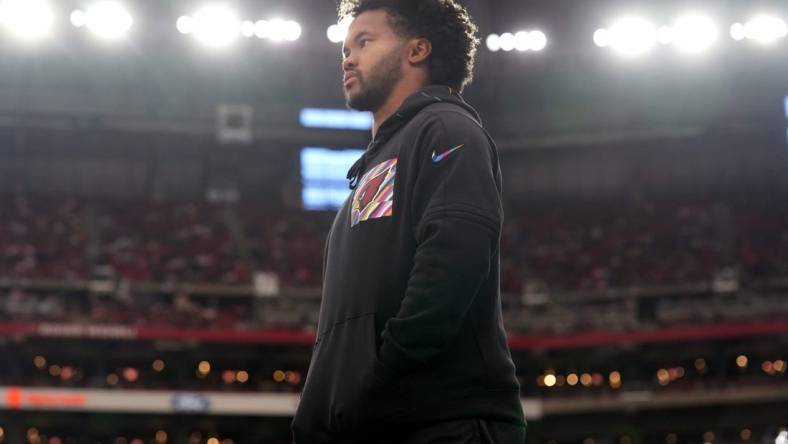 Arizona Cardinals quarterback Kyler Murray watches his team from the sidelines as they play against the Cincinnati Bengals at State Farm Stadium in Glendale on Oct. 8, 2023.