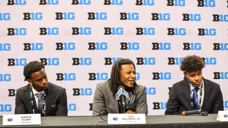 Oct 10, 2023; Minneapolis, MN, USA; Penn State Nittany Lions players Kanye Clary, Ace Baldwin Jr. and Puff Johnson speak to the media during the Big Ten basketball media days at Target Center. Mandatory Credit: Matt Krohn-USA TODAY Sports