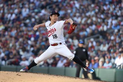 Oct 10, 2023; Minneapolis, Minnesota, USA; Minnesota Twins relief pitcher Kenta Maeda (18) pitches in the sixth inning against the Houston Astros during game three of the ALDS for the 2023 MLB playoffs at Target Field. Mandatory Credit: Jesse Johnson-USA TODAY Sports