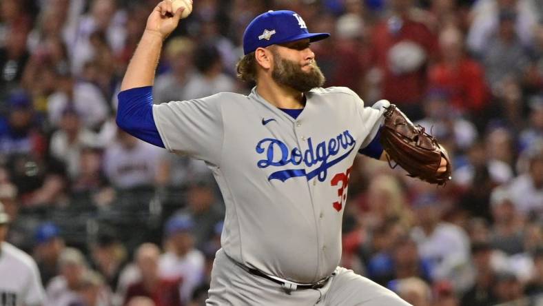 Oct 11, 2023; Phoenix, Arizona, USA; Los Angeles Dodgers starting pitcher Lance Lynn (35) throws a pitch against the Arizona Diamondbacks in the first inning for game three of the NLDS for the 2023 MLB playoffs at Chase Field. Mandatory Credit: Matt Kartozian-USA TODAY Sports