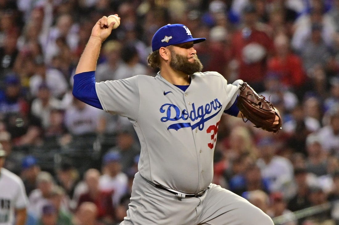 Oct 11, 2023; Phoenix, Arizona, USA; Los Angeles Dodgers starting pitcher Lance Lynn (35) throws a pitch against the Arizona Diamondbacks in the first inning for game three of the NLDS for the 2023 MLB playoffs at Chase Field. Mandatory Credit: Matt Kartozian-USA TODAY Sports