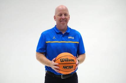 Oct 11, 2023; Las Vegas, NV, USA; UCLA Bruins coach Mick Cronin poses during Pac-12 Media Day at Park MGM Las Vegas Conference Center. Mandatory Credit: Kirby Lee-USA TODAY Sports
