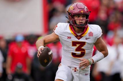 Oct 14, 2023; Cincinnati, Ohio, USA;  Iowa State Cyclones quarterback Rocco Becht (3) carries the ball for a touchdown against the Cincinnati Bearcats in the first half at Nippert Stadium. Mandatory Credit: Aaron Doster-USA TODAY Sports