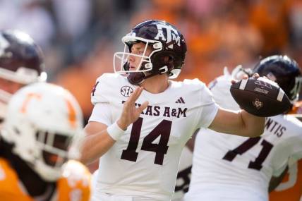 Texas A&M quarterback Max Johnson (14) throws a pass during a football game between Tennessee and Texas A&M at Neyland Stadium in Knoxville, Tenn., on Saturday, Oct. 14, 2023.