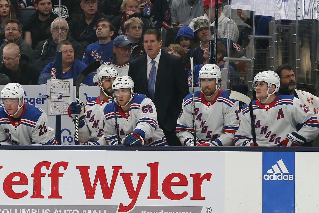 Oct 14, 2023; Columbus, Ohio, USA; New York Rangers head coach Peter Laviolette looks on during the first period at Nationwide Arena. Mandatory Credit: Russell LaBounty-USA TODAY Sports