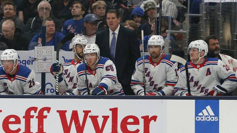 Oct 14, 2023; Columbus, Ohio, USA; New York Rangers head coach Peter Laviolette looks on during the first period at Nationwide Arena. Mandatory Credit: Russell LaBounty-USA TODAY Sports