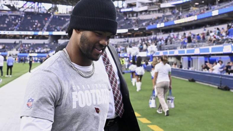 Oct 15, 2023; Inglewood, California, USA; Arizona Cardinals injured quarterback Kyler Murray walks off the field after the Los Angeles Rams defeat the Cardinals at SoFi Stadium. Mandatory Credit: Alex Gallardo-USA TODAY Sports