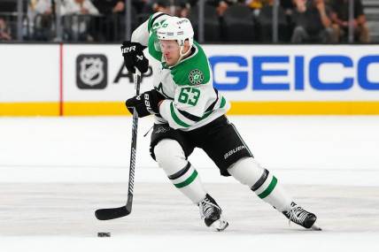 Oct 17, 2023; Las Vegas, Nevada, USA; Dallas Stars right wing Evgenii Dadonov (63) skates against the Vegas Golden Knights during an overtime period at T-Mobile Arena. Mandatory Credit: Stephen R. Sylvanie-USA TODAY Sports