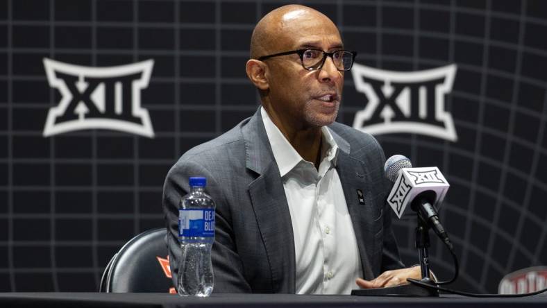 Oct 18, Kansas City, MO, USA; University of Central Florida head coach Johnny Dawkins answers questions at the Big 12 Men s Basketball Tipoff at T-Mobile Center. Mandatory Credit: Kylie Graham-USA TODAY Sports