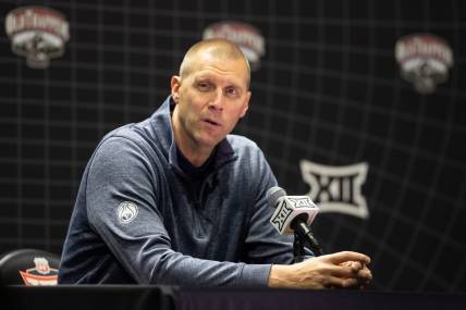 Oct 18, Kansas City, MO, USA; Brigham Young University head coach Mark Pope answers questions at the Big 12 Men s Basketball Tipoff at T-Mobile Center. Mandatory Credit: Kylie Graham-USA TODAY Sports