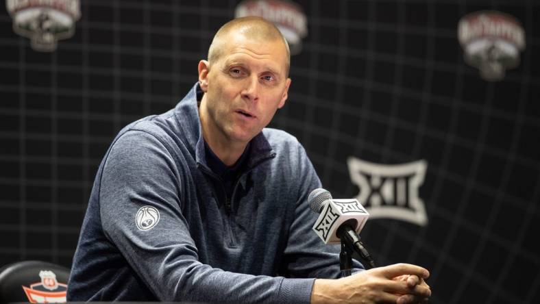 Oct 18, Kansas City, MO, USA; Brigham Young University head coach Mark Pope answers questions at the Big 12 Men s Basketball Tipoff at T-Mobile Center. Mandatory Credit: Kylie Graham-USA TODAY Sports