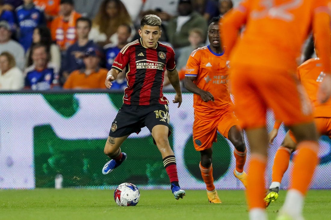 Oct 21, 2023; Cincinnati, Ohio, USA; Atlanta United FC midfielder Thiago Almada (10) dribbles against FC Cincinnati in the second half at TQL Stadium. Mandatory Credit: Katie Stratman-USA TODAY Sports