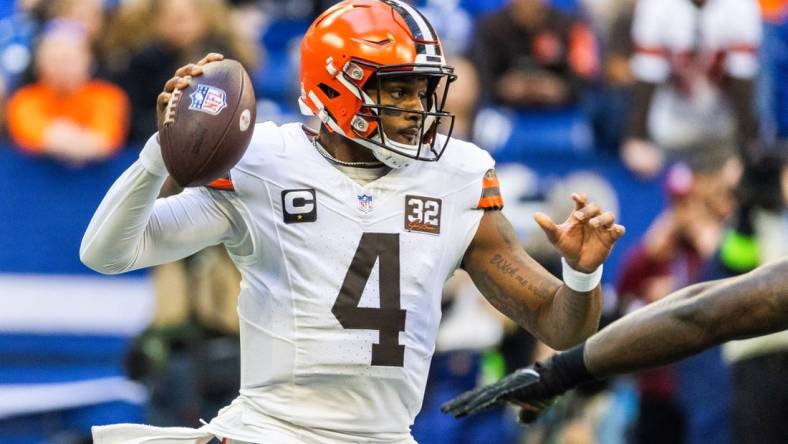 Oct 22, 2023; Indianapolis, Indiana, USA; Cleveland Browns quarterback Deshaun Watson (4) drops back to pass the ball in the first quarter against the Indianapolis Colts at Lucas Oil Stadium. Mandatory Credit: Trevor Ruszkowski-USA TODAY Sports