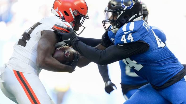 Indianapolis Colts linebacker Zaire Franklin (44) works to stop Cleveland Browns running back Jerome Ford (34) on Sunday, Oct. 22, 2023, during a game against the Cleveland Browns at Lucas Oil Stadium in Indianapolis.