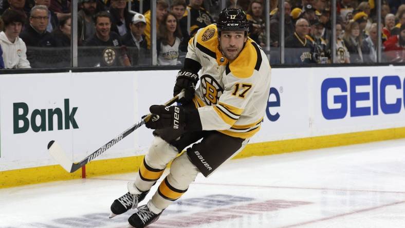 Oct 11, 2023; Boston, Massachusetts, USA; Boston Bruins left wing Milan Lucic (17) against the Chicago Blackhawks during the second period at TD Garden. Mandatory Credit: Winslow Townson-USA TODAY Sports