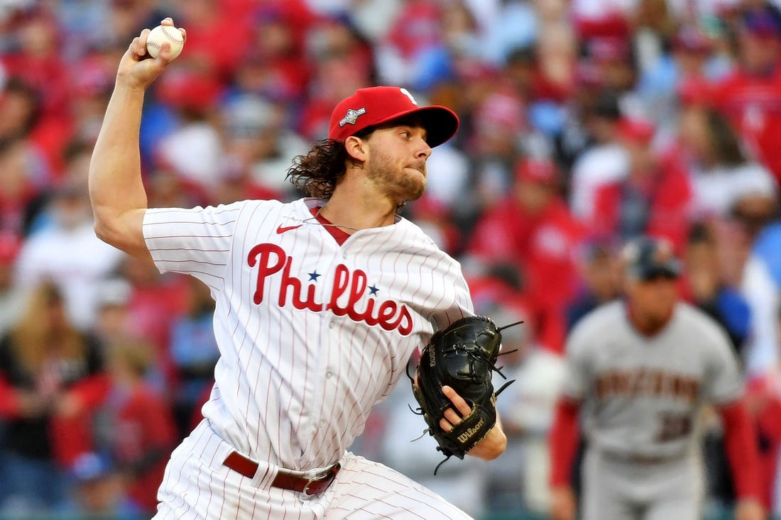 Oct 23, 2023; Philadelphia, Pennsylvania, USA; Philadelphia Phillies starting pitcher Aaron Nola (27) pitches during the first inning against the Arizona Diamondbacks in game six of the NLCS for the 2023 MLB playoffs at Citizens Bank Park. Mandatory Credit: Eric Hartline-USA TODAY Sports