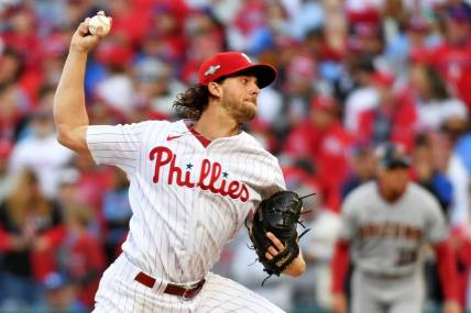 Oct 23, 2023; Philadelphia, Pennsylvania, USA; Philadelphia Phillies starting pitcher Aaron Nola (27) pitches during the first inning against the Arizona Diamondbacks in game six of the NLCS for the 2023 MLB playoffs at Citizens Bank Park. Mandatory Credit: Eric Hartline-USA TODAY Sports